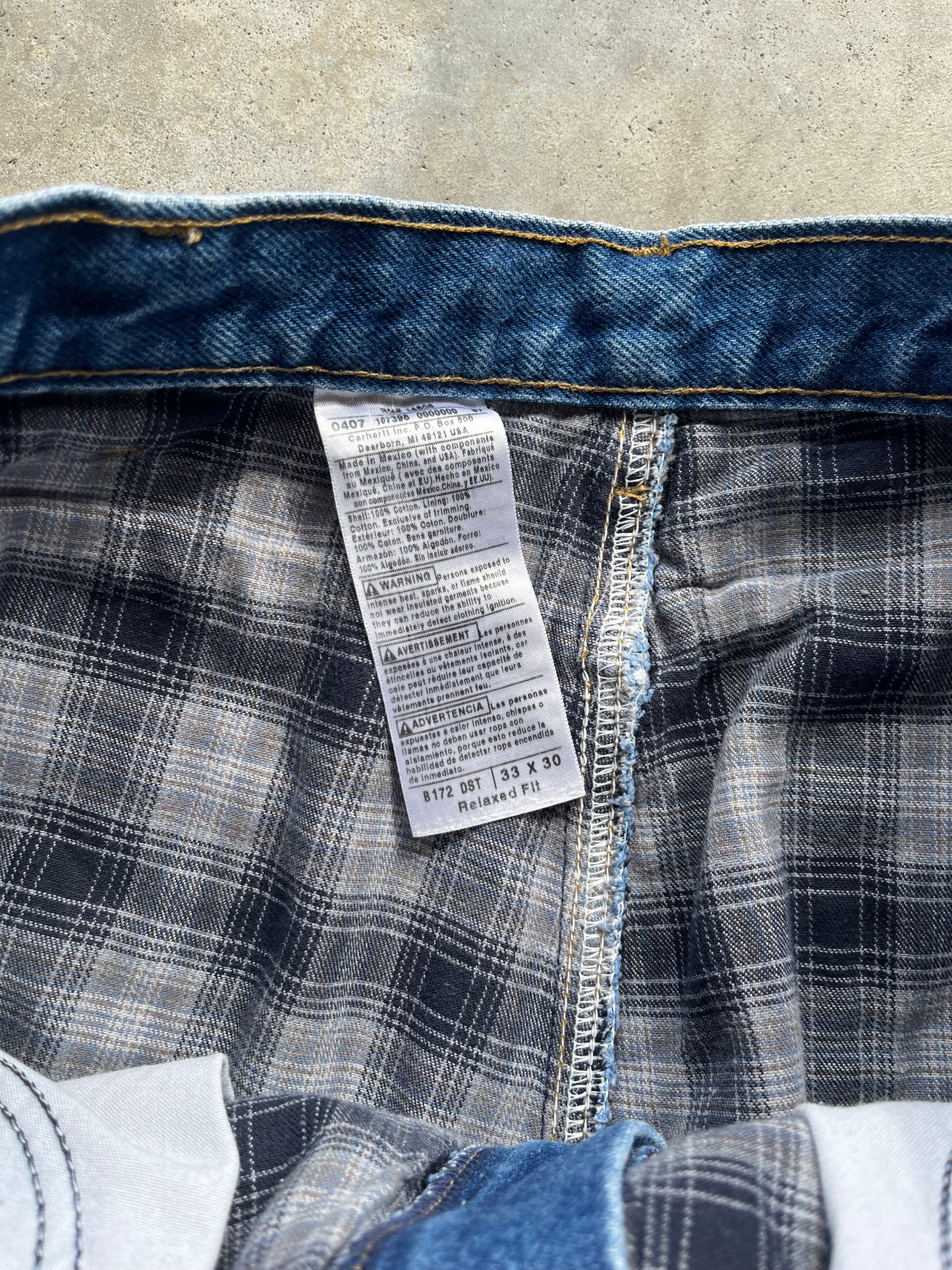 (33 x 30) Denim Plaid-Lined Carhartt Jeans