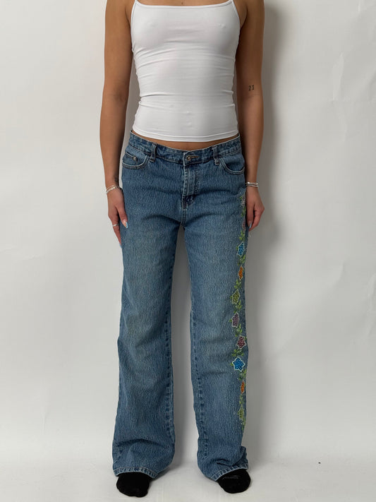 (10) 00s Cosmopolitan Flower Embroidered Jeans